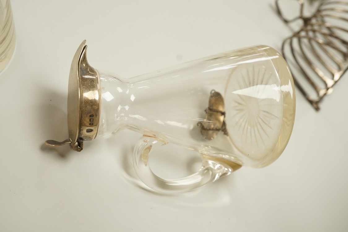 A pair of Edwardian silver mounted whisky noggins by J & J Maxfield Ltd, Birmingham, 1908, one damaged and a pair of matching silver 'Whisky' wine labels, together with a pair of late Victorian silver posy vases by Willi